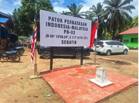 Border marker between Malaysia and Indonesia in inland Sebatik island